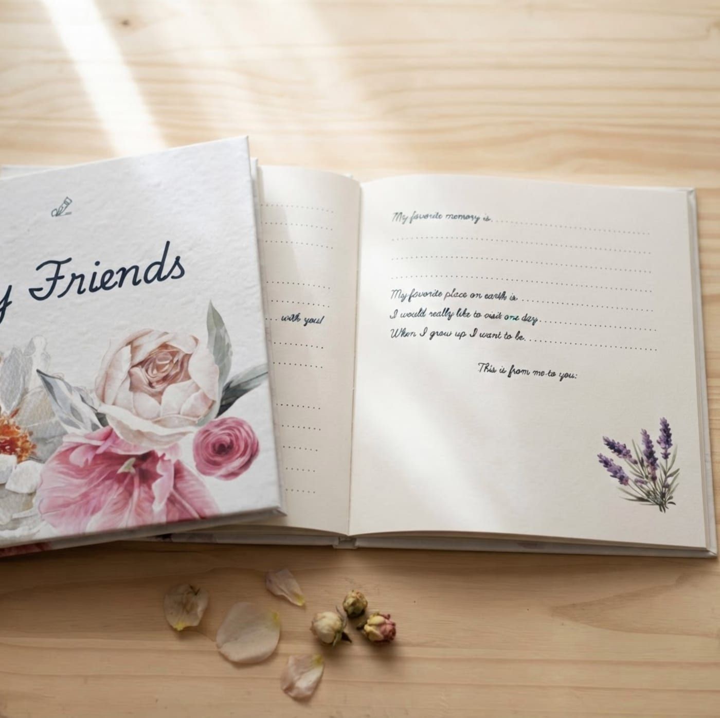 Open interior spread of the Flowers edition with fill-in prompts