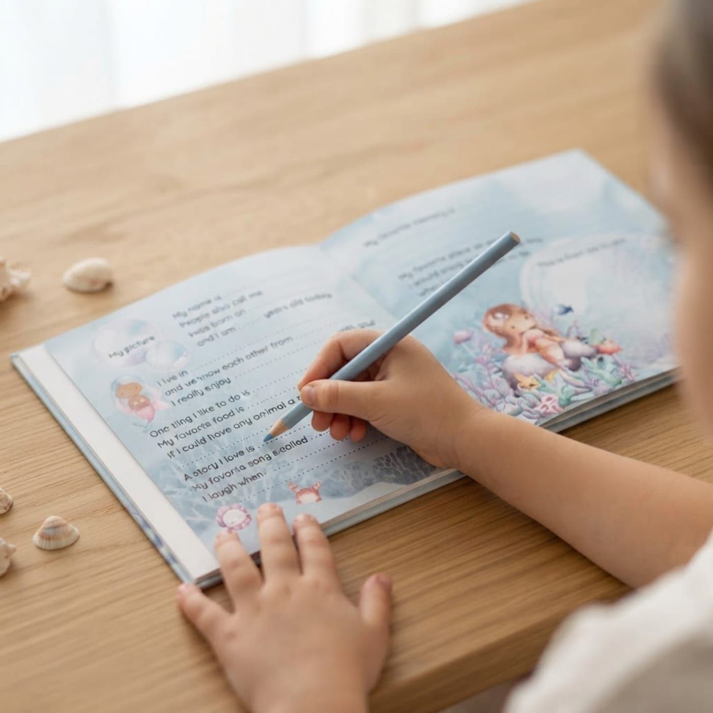 A child using the Mermaids edition of My Friends Book