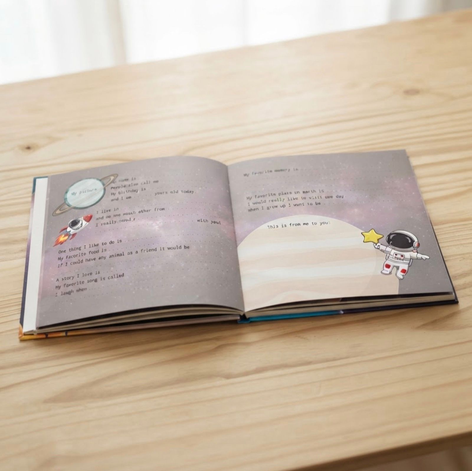 Open interior spread of the Space edition with fill-in prompts