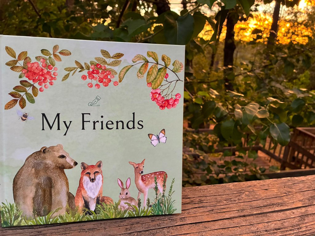 My Friends Book keepsake standing on a wooden deck outdoors
